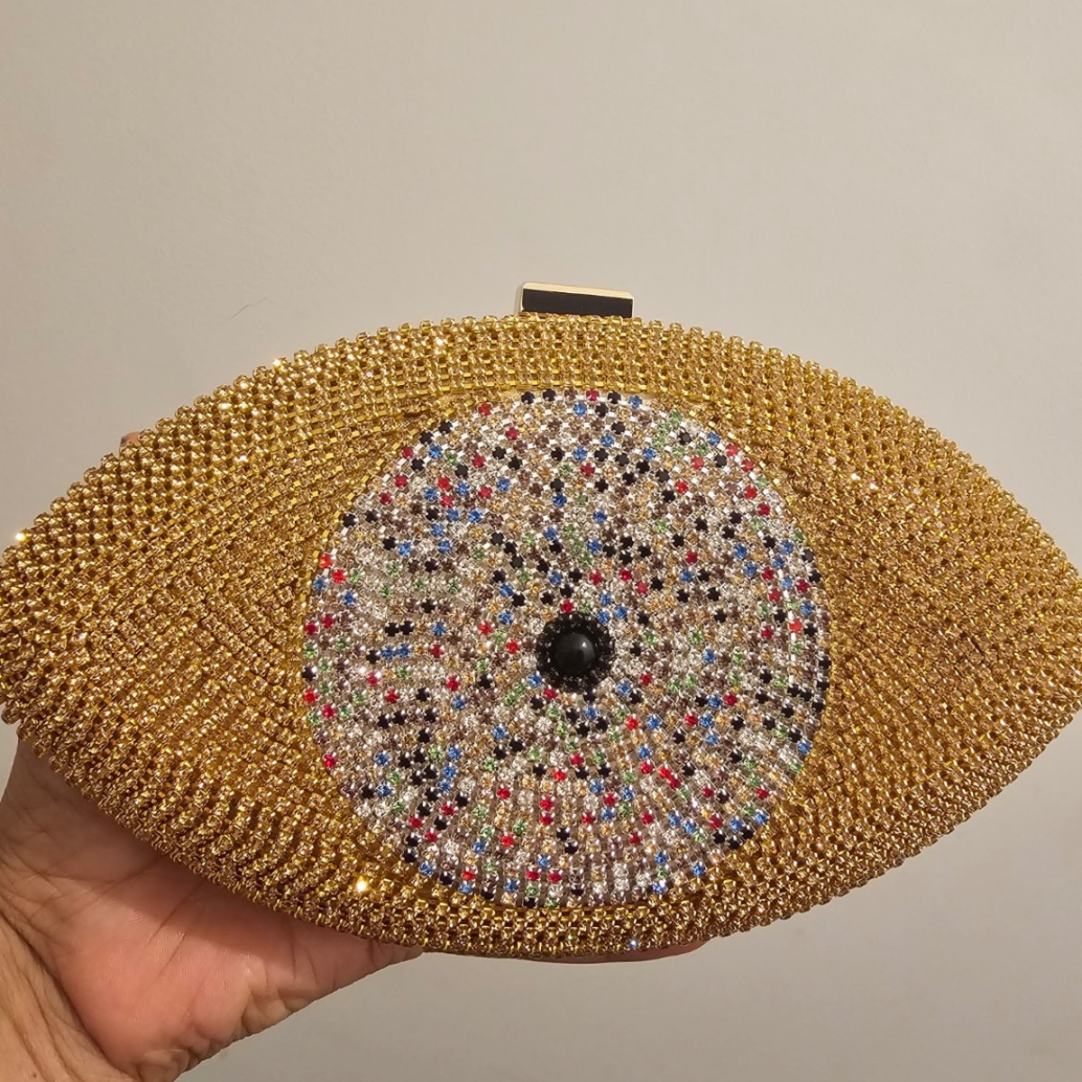 Amara Crystal Eye Clutch ladies clutch bag in Antique Gold