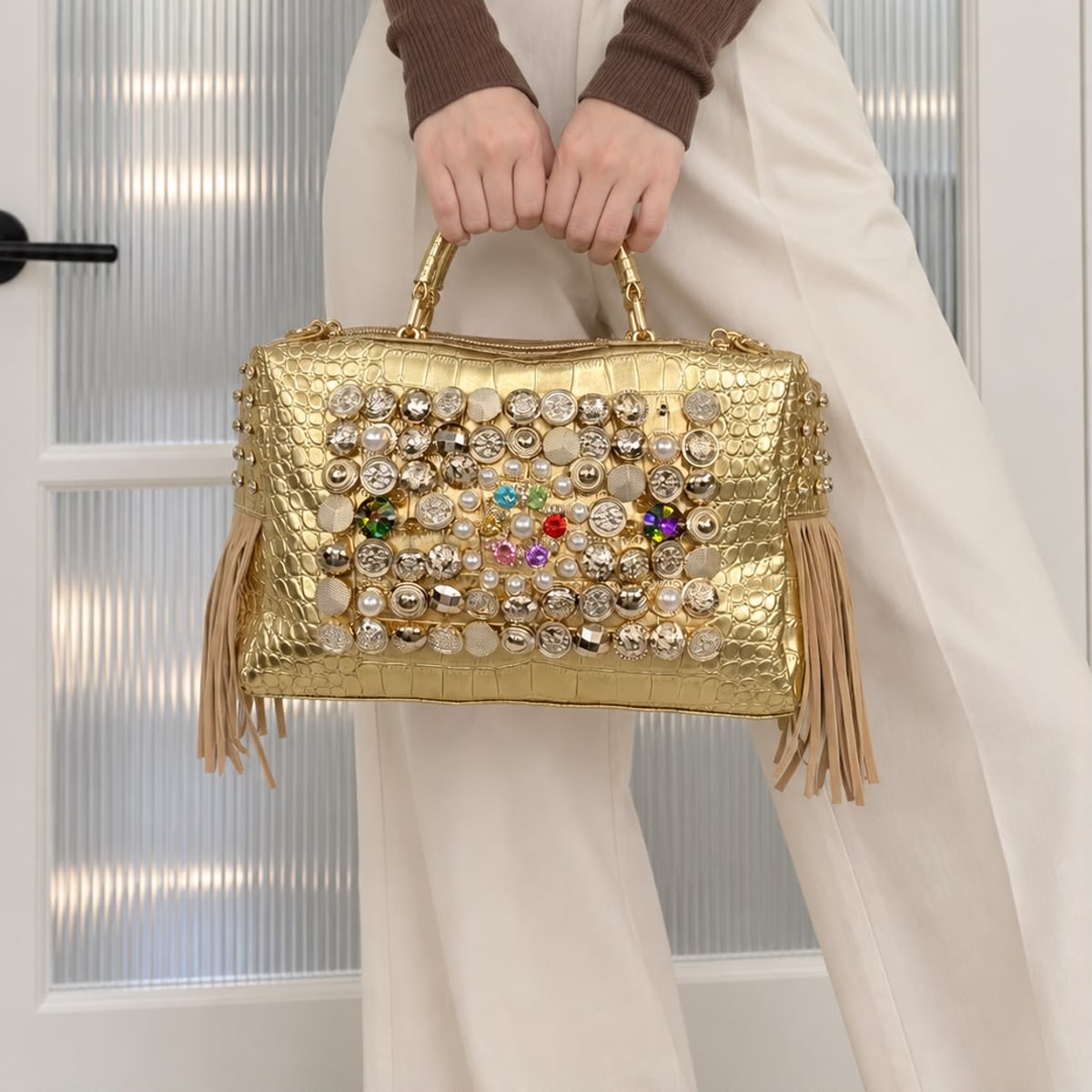 Lucia Embellished Top Handle Bag in Gold